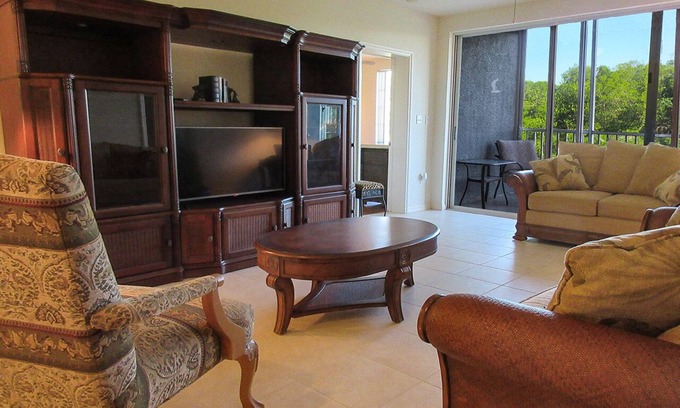 South Island Condo | Relax In The Sunshine! Lovely 2B/2B Vacation Condo w/All Weather Lanai, Walk To Beach, Resort Pool!