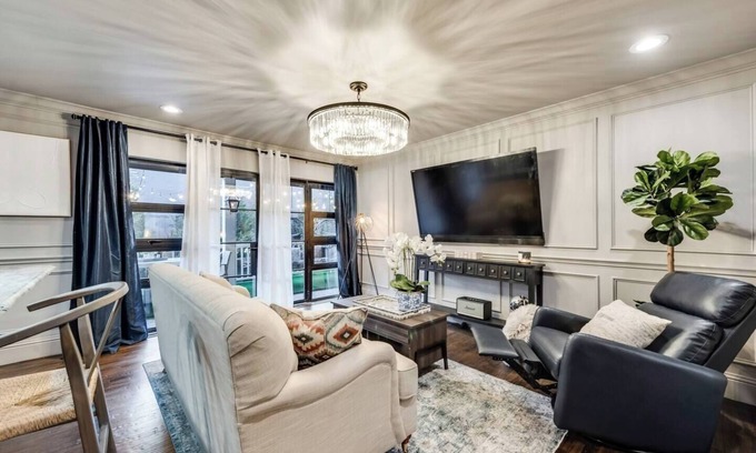 Peak's Suburban Addition Condo | Relax in this luxury 1BR condo minutes from Downtown, Uptown & Highland Park. Features high-speed WiFi (330 Mbps), 65” smart TV, marble counters, washer/dryer, water purification system, & king luxury hybrid bed with 300TC Egyptian cotton sheets.
