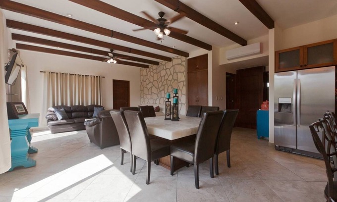 Villa Juarez Condo | Relax to the sound of a waterfall right outside your window!