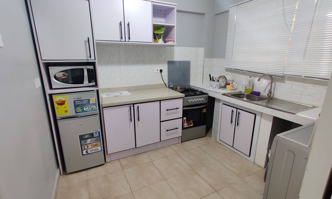 Tema Condo | Relaxation Redefined- Cozy General Vacation Condo, near Palace Mall Comm 26,Tema