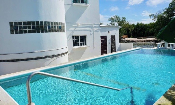 Belize City Apartment | Relaxing Studio w SeaView Pool & Deck near Airport