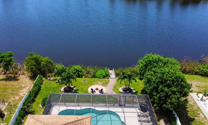 Bonita Springs House | Remodeled Lakefront Pool Home, Privacy, screened Lanai, Bicycles, close to Beach