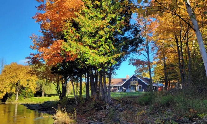 Rumely Cabin | Remodeled lodge on 73 acres with 1/2 mile riverfront in Michigan's UP wilderness