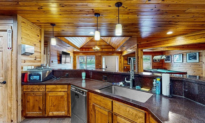 Bentonville Cabin | Remodeled two-story cabin with full kitchen, wrap-around deck, grill, partial AC