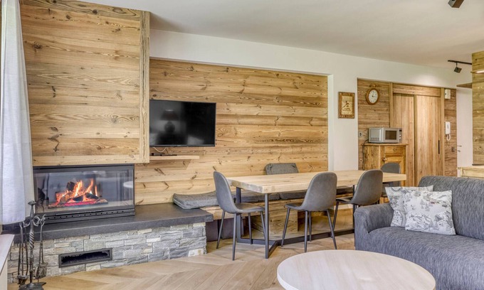Le Planellet Apartment | Renovated 2-Bedroom Apartment in Megève Centre with Balcony, Fireplace, and Covered Parking