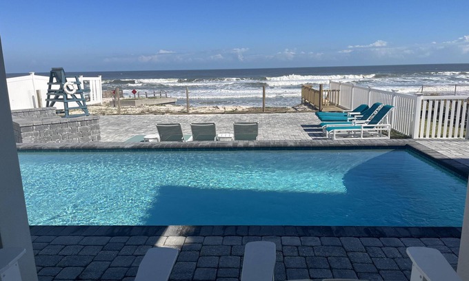 New Smyrna Beach House | Renovated, direct oceanfront 5BR/6BA private pool home sleeps 16.