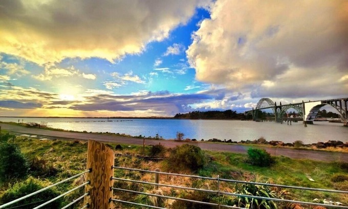 Newport Condo | Renovated Waterfront home with gorgeous views of the Bay, Bridge and South Jetty