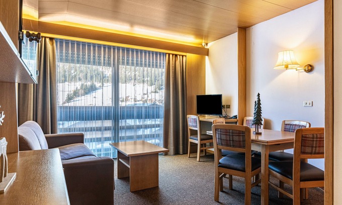 San Giovanni di Fassa Apartment | "Residence Anda Appartamento 42" with Views of the Dolomite Peaks, Shared Indoor Pool & Jacuzzi