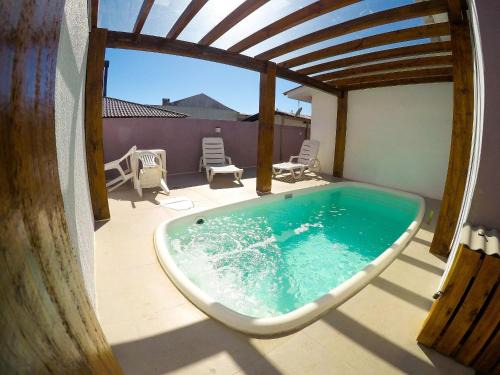 Torres Apartment | Residencial da Bia - Casas com 2 Dorms na Praia da Cal com Piscina Térmica