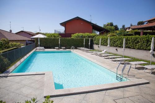 Massino Visconti Apartment | Residenza La Corte Visconti - Deluxe flat with pool and patio