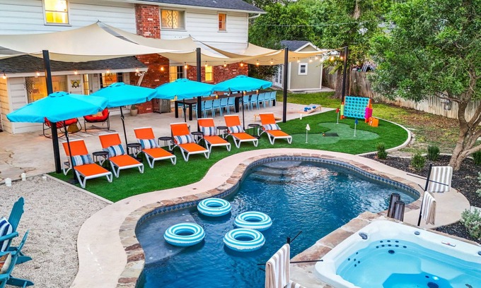 Medical Center District House | Resort Style Backyard Pool Putt Putt Hot Tub