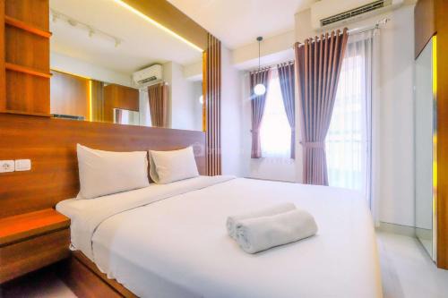 Depok Apartment | Restful and Minimalist Studio Transpark Cibubur Apartment By Travelio
