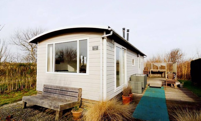 Hollum Ski Chalet | Restful Dune Chalet in Hollum between Golf course and Beach