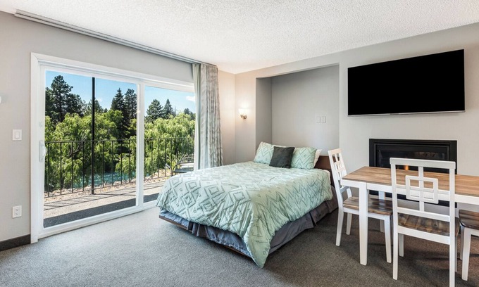 Bend Condo | Riverfront Studio With Spectacular River View. Pool Access. WiFi.