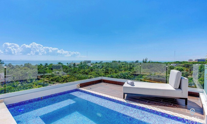 Villa Juarez Condo | Rooftop Retreat | Pool | Gym | BBQ | Near Beach!