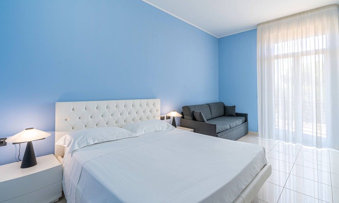 Pachino Apartment | Room 'Blue Sky - Quadrupla Deluxe' with Sea View, Wi-Fi and Air Conditioning