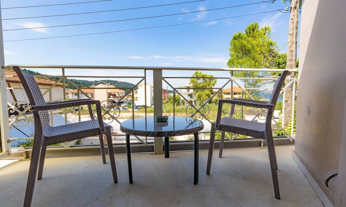 Nikiana Apartment | Room 'Garden View - Aeolus Building' with Shared Pool, Shared Garden and Air Conditioning