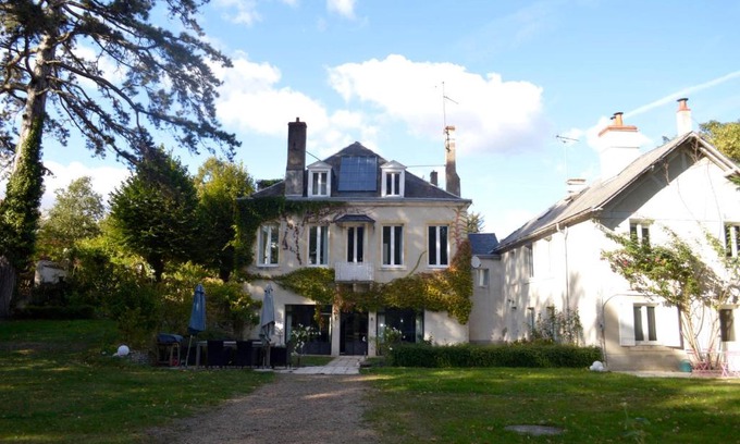 Saint-Jean-le-Blanc House | Room in Guest room - Maison lAmerique welcome you to one of their rooms Dogs are also welcomed