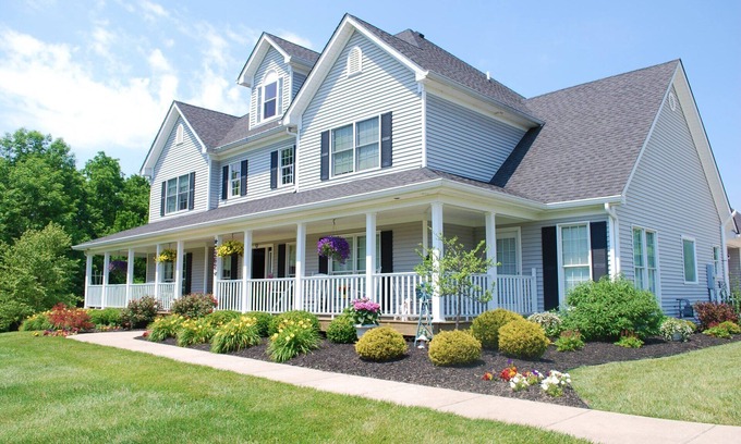 La Grange Bed & Breakfast | Room with a View King Luxury Suite with extra-large large soaking tub and a chaise lounge with a view of the pond.