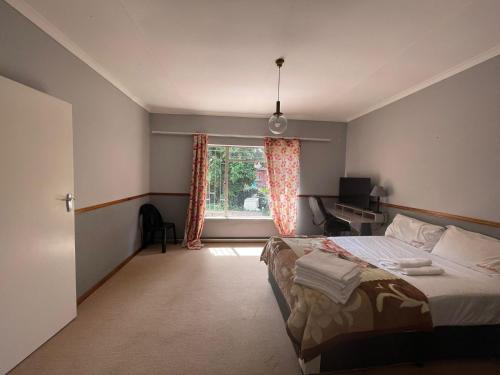 Garsfontein House | Rooms in a guest-only home behind Menlyn Maine