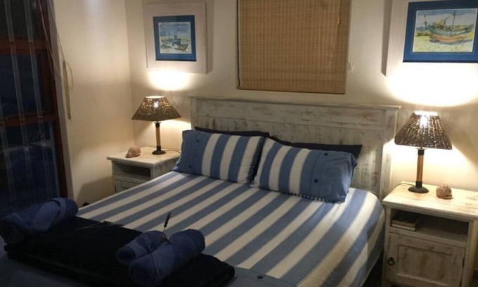 St. Helena Bay House | Rusbiki 8 guests · 3 bedrooms · 6 beds · 2.5 baths