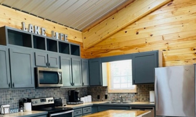 Arley Cabin | Rustic chic cabin on the lake, fire pit and peaceful lake views!
