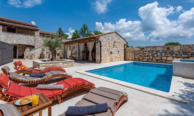 Marcana House | Rustic stone holiday house with pool