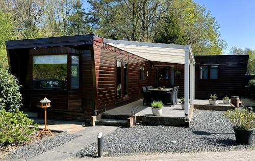 Krachtighuizen Ski Chalet | Rustiek bos chalet Sven