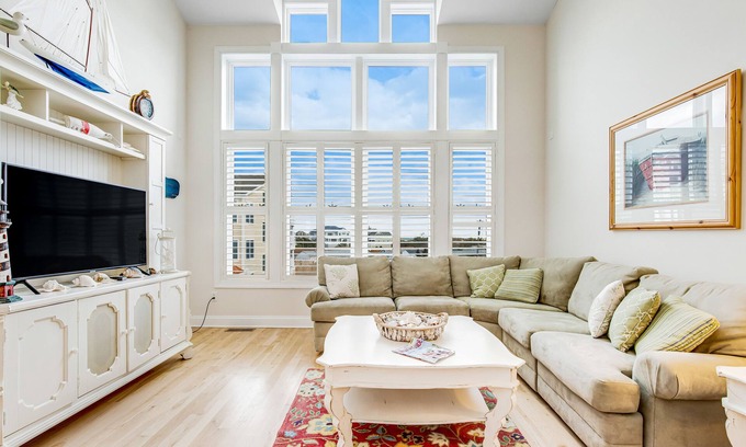 Fenwick Island House | Salt Meadows townhouse w/elevator, gas grill & community pool and pier