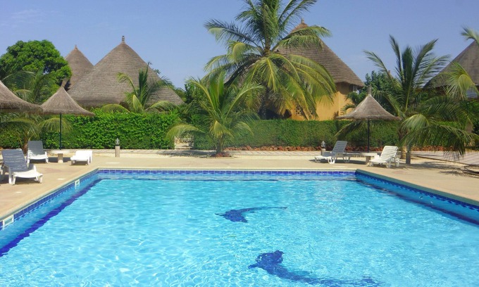 Saly House | Saly: SUN and disorientation assured in an african residential villa.