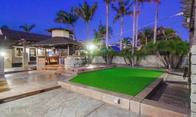 Rolando Village Villa | San Diego Villa with Huge Backyard, Hot Tub, Fire Pit, Grill, Outdoor TV & Bar