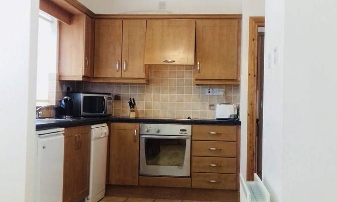 Downings House | Sandy Hills Cottages, overlooking Rosapenna Golf Resort and Tramore Beach