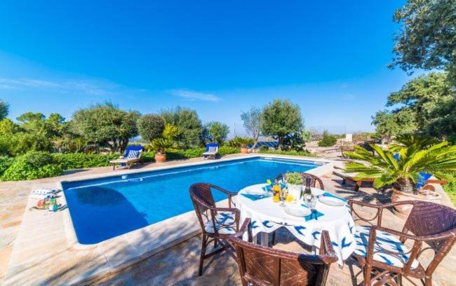 Sant Joan House | Sant Joan Holiday Home Sleeps 4 with Pool and WiFi