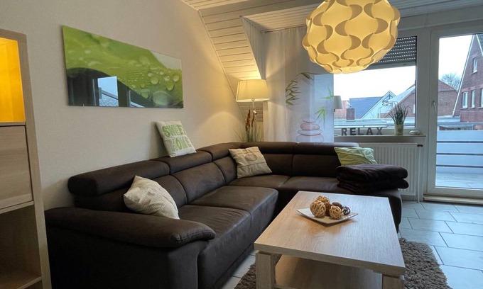 Norddeich Apartment | Schöne Oberwohnung Sandfloh in strandnaher Lage