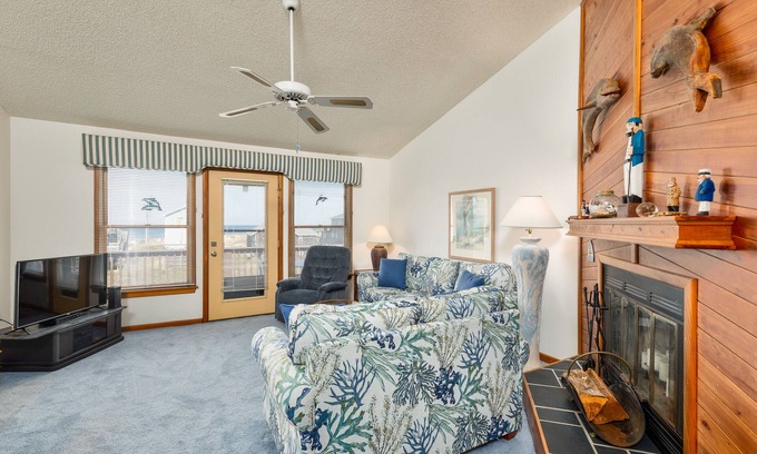 Kitty Hawk Condo | Sea Dunes condo with community pool and tennis, beach access, porch swing, baby gate, and WiFi