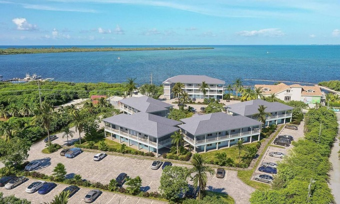 West Bay Apartment | Sea Mist 308 Stunning views of North Sound in West Bay close to attractions.
