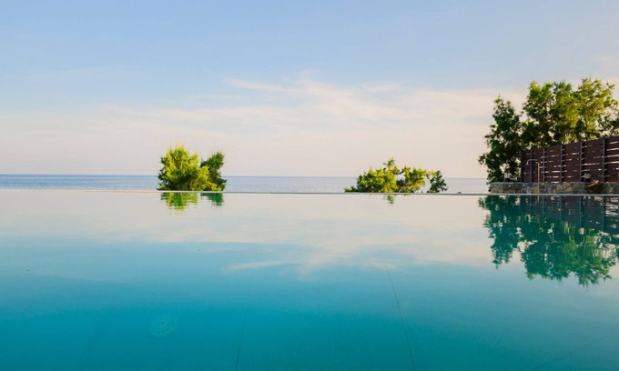Mavros Kolimpos Villa | Seafront 4-bedroom Villa Grand Blue in Mavros Kolimpos with lovely sea views!