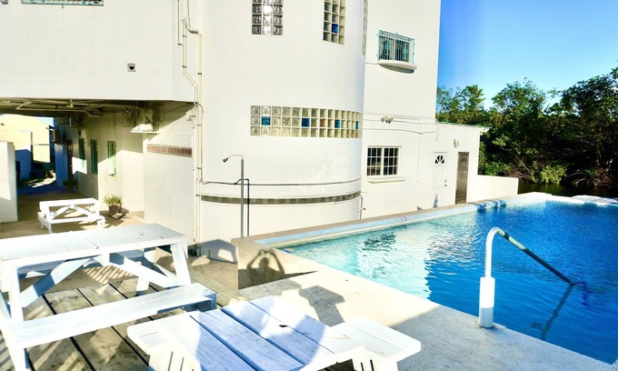 Belize City Apartment | See Belize SUNRISE 2-bed Studio, 1st Floor with Infinity Pool & Overwater Deck