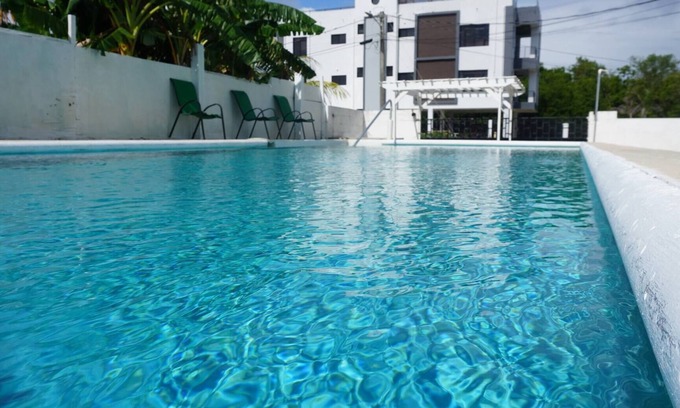 Belize City Apartment | See Belize Waterside Sea View 2-bedroom Apartment w Balcony, Pool & Deck 2nd FL