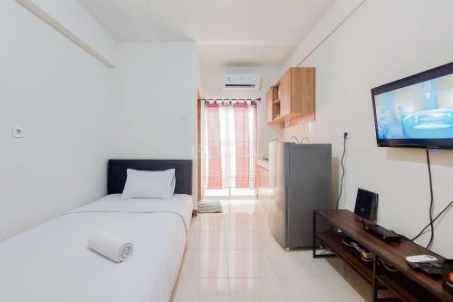 South Tangerang Apartment | Serene and Nice Studio at Loftvilles City Apartment By Travelio