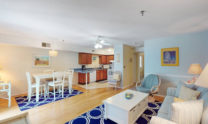 Caine Woods Condo | Serene condo with central AC, deck & washer/dryer - near golf