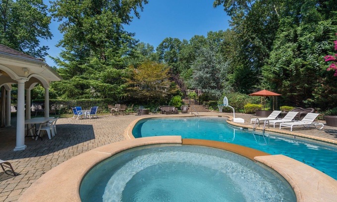 Old Westbury House | Serene Haven: Stunning Yard, Pool, and Views by RedAwning