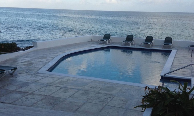 Nassau House | Serenity Nassau - Waterfront Views from Every Room, Beach/Pool