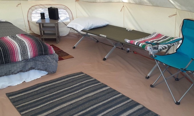 Spring Branch RV Rental | Shady Oaks Glamping Tent Queen Bed, 2 Cots, AC and Electricity