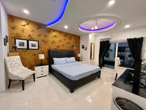 Balibago Apartment | Sheryll Escapes - Kandi Palace Grand 2 BR! Housekeeping, Internet!