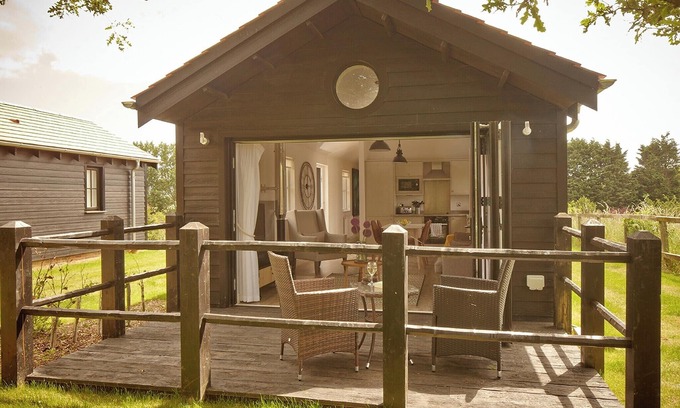 Rookley Ski Chalet | Situated around the lake.