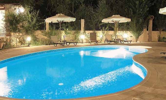 Drosia House | Situated within lush, beautifully maintained gardens, this renovated stone built property is a stunn