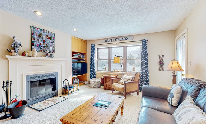 Ludlow Condo | Ski-in/out condo with mountain views, fireplace, pool, & hot tub