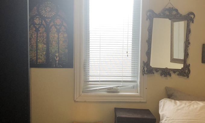 Regal Heights House | Small cozy room with bathroom on main floor