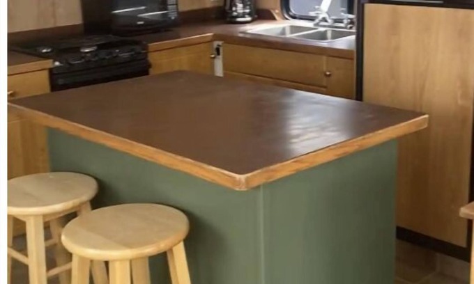 Lake Cowichan Boat Rental | “Snowbird” Houseboat with roof top Hot tub and Slide.
